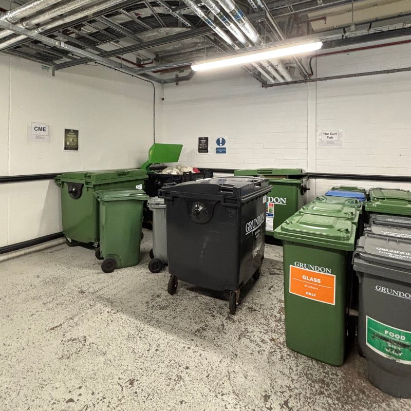 Waste containers awaiting collection